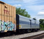 A surprise on the rear of CSX L214 was this passenger car